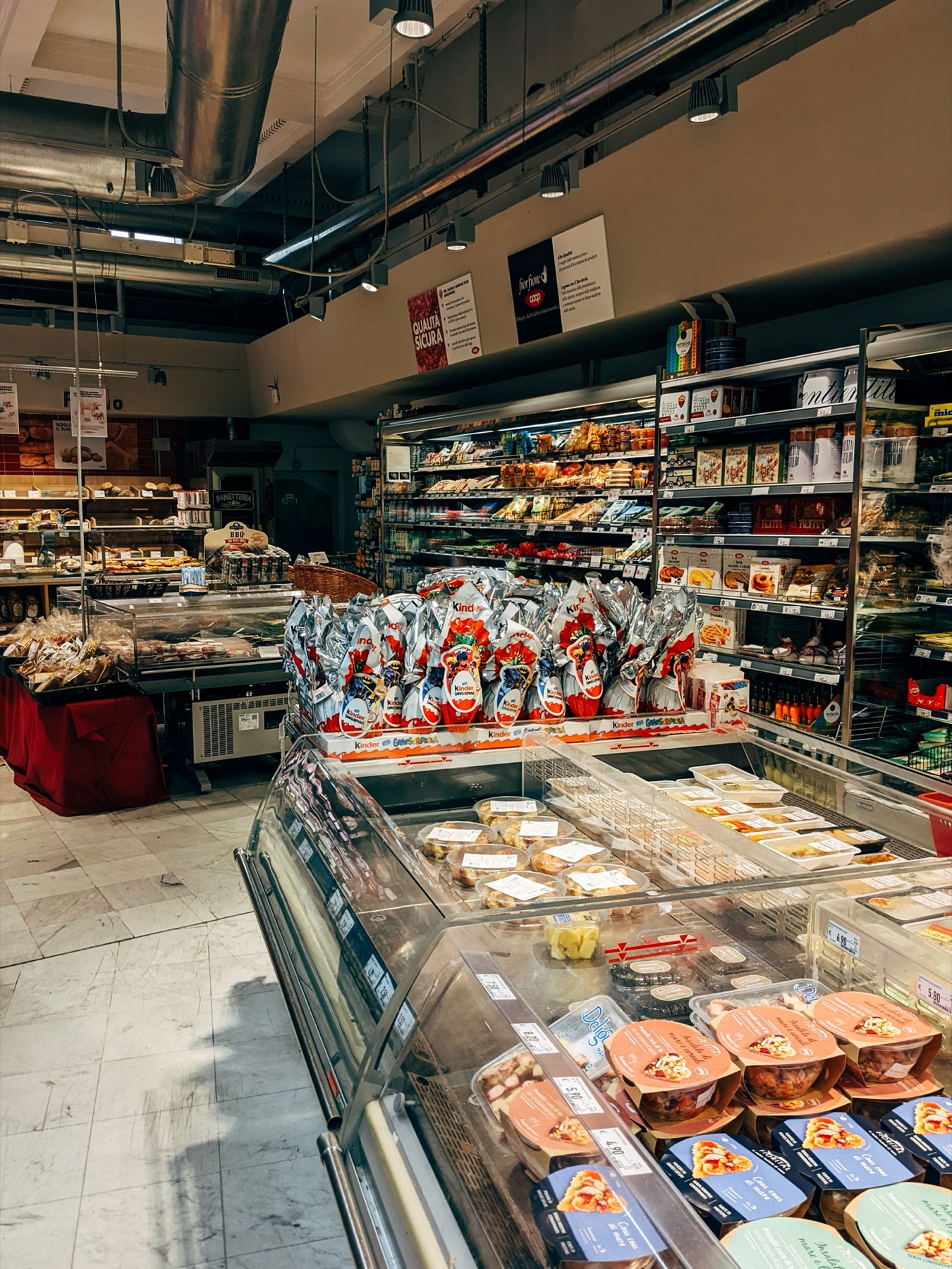 Modern grocery store with stocked product displays